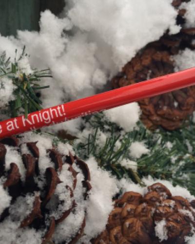 write at knight pencil in snowy wreath