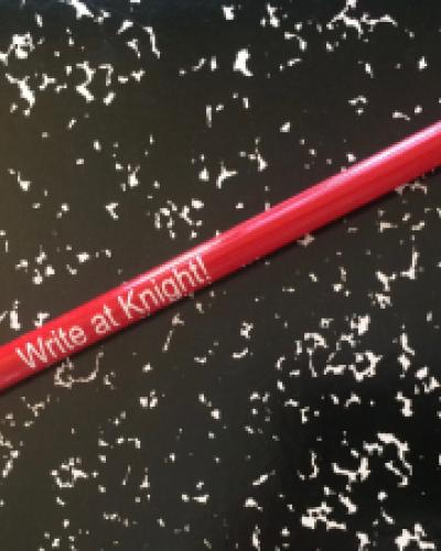 Write at Knight pencil on a composition notebook